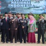 Pjs Bupati Dompu Baiq Nelly Yuniarti, AP., M.Si menhgadiri Upacara HUT TNI ke-79  Tahun 2024